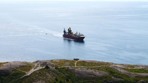 Boat sailing on sea in newfoundland