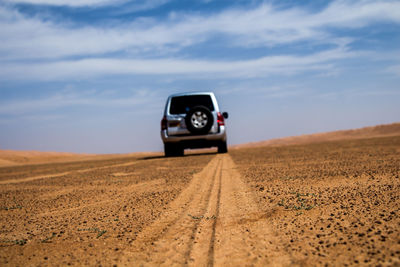 Rear view of a vehicle at desert
