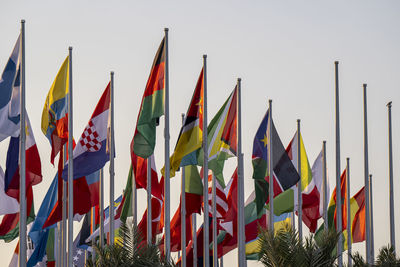 The flag plaza, displays 119 flags countries in the world. located in doha, qatar.