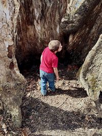 Girl standing on rock