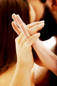 Close-up of hand holding hands