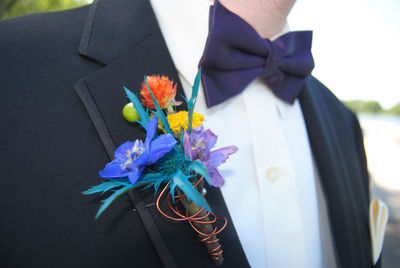 Close-up of hand holding bouquet