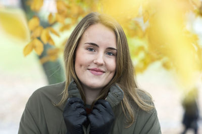 Portrait of smiling young woman