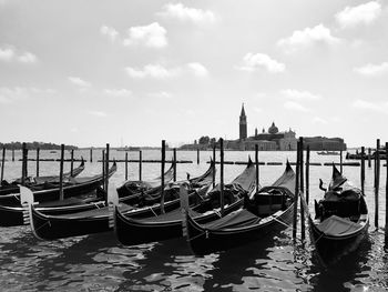 Gondolas  in sea against sky