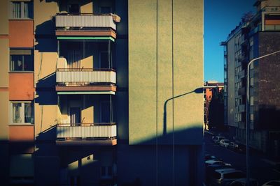 Buildings against sky on sunny day