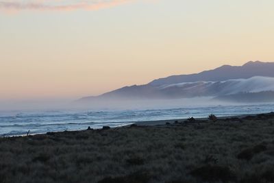 Scenic view of sea at sunrise