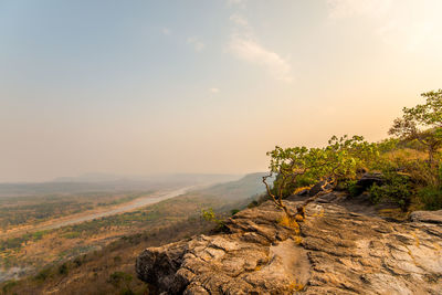 Scenic view of landscape against sky during sunset