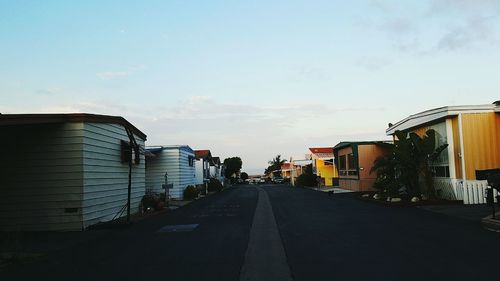 Road leading towards buildings