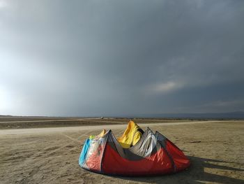 Tent on beach against sky