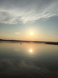 Scenic view of sunset over river