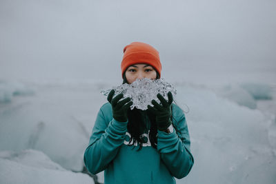 Portrait of girl with snow covered face