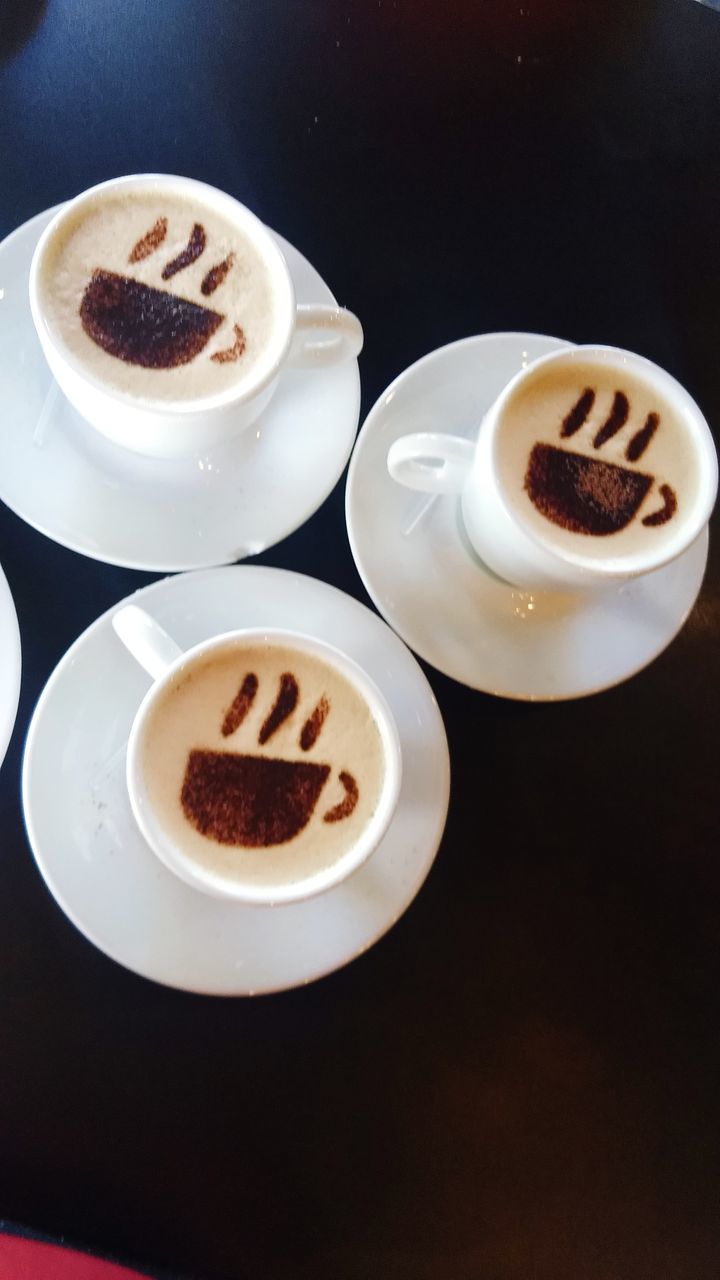 CLOSE-UP OF COFFEE CUP WITH BLACK TEA