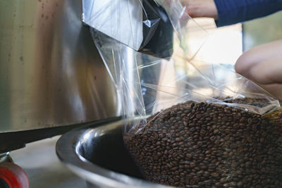 Close-up of person preparing food