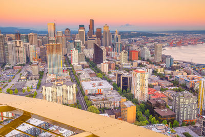 High angle view of buildings against sky during sunset