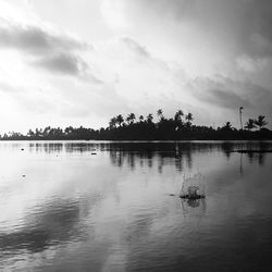 Scenic view of calm sea against sky