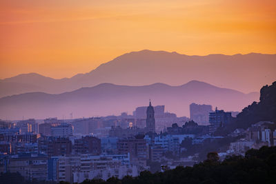 High angle view of townscape against sky during sunset