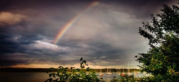 Scenic view of storm clouds over landscape