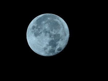 Close-up of moon against clear sky at night