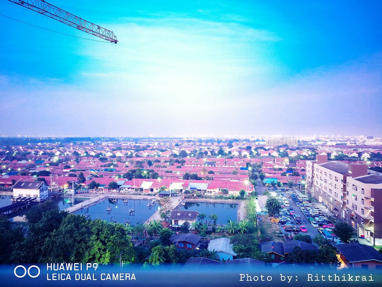 sky, flying, mid-air, aerial view, cityscape, outdoors, cloud - sky, city, building exterior, airplane, stadium, no people, urban skyline, nature, day