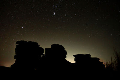 Silhouette people at night