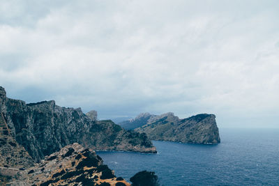 Scenic view of sea against cloudy sky