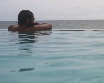 Portrait of man in swimming pool