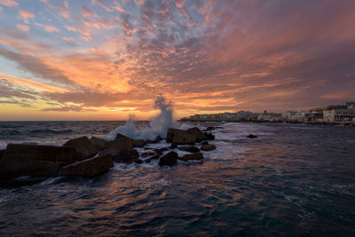 Scenic view of sea against sky during sunset