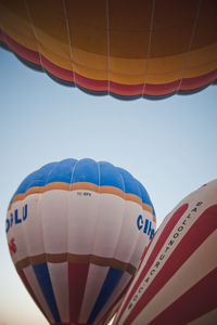 Low angle view of hot air balloon against clear sky