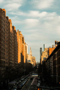 Buildings in city against sky