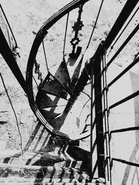 Low angle view of rusty bicycle against wall