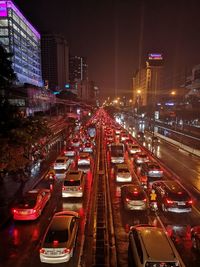 High angle view of traffic on city street at night