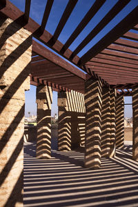 Low angle view of building against sky on sunny day