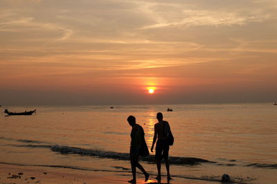 Scenic view of sea at sunset