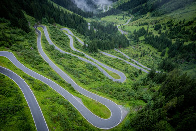 High angle view of road amidst mountain