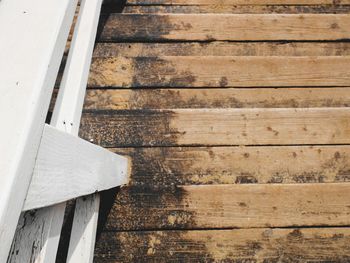 High angle view of weathered wooden wall