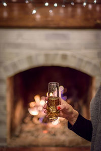 Close-up of woman holding wine glass