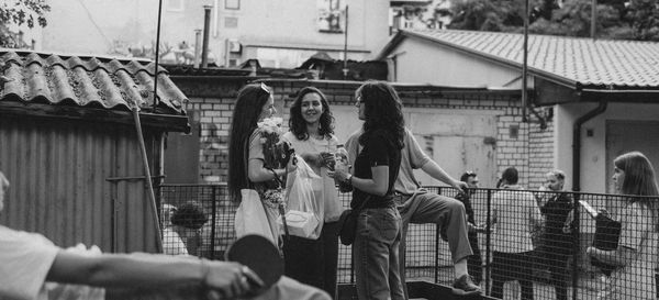 Group of people in front of building