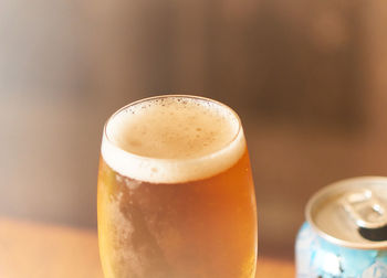 Close-up of beer glass on table