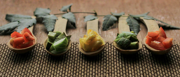 Close-up of chopped fruits on table