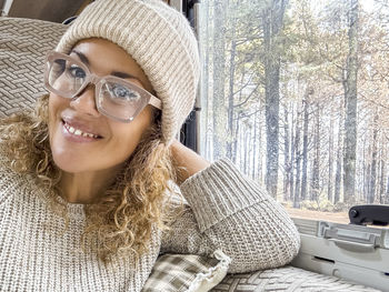 Portrait of young woman in sunglasses