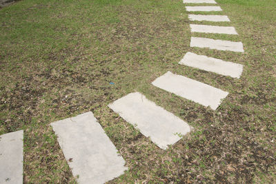 High angle view of road marking on field
