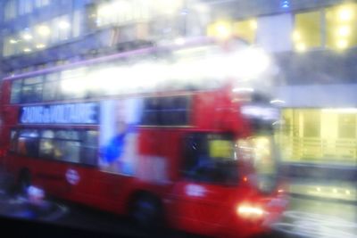 Blurred motion of cars on road in city at night