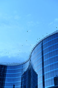 Low angle view of modern building against sky