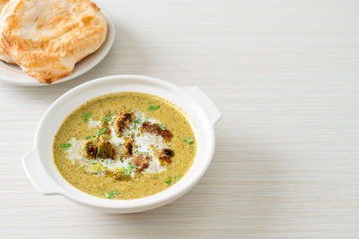 High angle view of soup in bowl on table