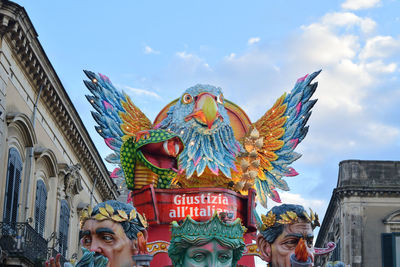 Low angle view of statue against sky