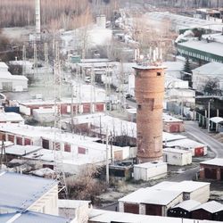 High angle view of buildings in city during winter