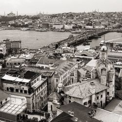 High angle view of river amidst buildings in city