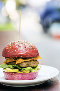 Close-up of burger in plate on table