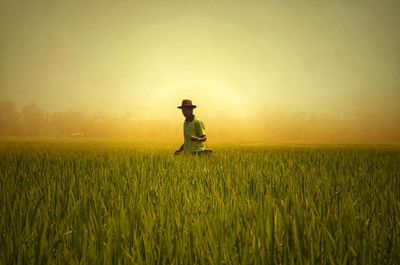 Man standing in field