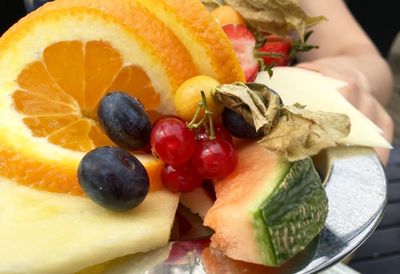 Close-up of fruits in plate